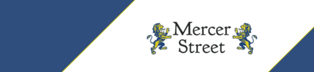 Diagonal view of a sign or banner with the text 