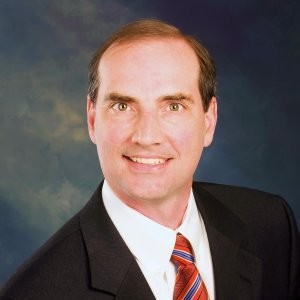 Headshot of Sam Evans, CFA, CExP